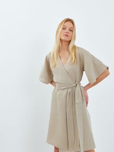 "MARY is a short sleeve midi linen wrap dress. DETAILS - Wrap robe - Self tie belt - Dolman style sleeves - Knee length - 100% lightweight European linen fabric - Cut and sewn to order just for you in our studio COLOR - Undyed, you can also choose other colors above - Fabric samples are available here https://www.etsy.com/listing/586569696/linen-fabric-samples SIZING & FIT - Relaxed fit - True to size - Measurements taken from a size S - Model is 5'8\" / 173cm and wearing a size S CARE FOR LINEN - Machine wash up to 30ºC/86ºF gentle cycle - Lay flat to dry or tumble dry low - Warm iron if needed - Do not bleach SIZE GUIDE Size conversion guide Size XS (US 0-2, IT 36-38, UK 4-6, Japan 3-5, France 32-34) Size S (US 4-6, IT 40-42, UK 8-10, Japan 7-9, France 36-38) Size M (US 8-10, IT 44-46, U Wrap Dress Linen, Summer Wrap Dress With Kimono Sleeves And Belted Waist, Summer Wrap Dress With Kimono Sleeves And Belt, Beige Wrap Dress With Tie Waist, Linen Belted V-neck Midi Dress, Belted Linen V-neck Midi Dress, Belted V-neck Linen Midi Dress, Belted Linen Wrap Dress, Spring Short Sleeve Belted Linen Dress