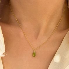 Raw Peridot Necklace! A Peridot drop pendant to offer as a Jewelry gift or birthday gift. Did you know? Peridot is August's birthstone. So, this minimalist necklace is a great idea for  Virgo gifts or  Leo gifts. ✔️Genuine  Peridot Necklace✔️ You will love this bright green color of nature. High-Quality 925 Sterling Silver * Finish 24K Gold  This Peridot Drop necklace is great for wearing alone or for layering with other necklaces.   Handmade in Greece.   You can get it within 2-5 business with Green Charm Necklace For May Birthstone Gift, Green Teardrop Pendant Drop Necklace As Gift, Green Teardrop Pendant Drop Necklace For Gift, Delicate Green Birthstone Necklace For Gift, Green Gemstone Necklace For Birthday, Green Teardrop Pendant Necklace For May Birthstone, Green Drop Necklace For May Birthstone, Green Teardrop Necklace For May Birthstone, Green Necklace For May Birthstone Birthday