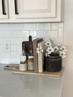 the kitchen counter is clean and ready to be used as a place for some personal care items