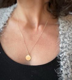 The tiny circle pendant disc is weighted nicely despite it's small size.  While the 14K gold filled chain is delicate looking, it is very strong and will hold up to everyday wear.  This necklace is perfect as a gift, for a wedding or as a bridesmaids gift.  Each necklace will arrive arranged on a keepsake card and enclosed  in a matte black gift box - free "bridesmaid thank you cards" are provided as well.►Chain is 1.4mm flat cable chain, pendant diameter is 12mm►Model wearing 20 inch chain►Mess Large Gold Pendant, Bridesmaid Thank You Cards, Princess Cut Diamond Earrings, Sterling Silver Diamond Earrings, Gold Circle Necklace, Bridesmaid Thank You, 16 Inch Necklace, Gold Chain With Pendant, Round Pendant Necklace