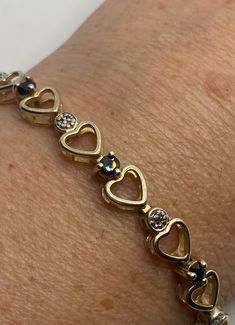 Vintage Diamond Sapphire Heart Bracelet Golden 925 Sterling Silver https://www.etsy.com/listing/1187710638/vintage-diamond-sapphire-heart-bracelet?utm_source=crowdfire&utm_medium=api&utm_campaign=api Diamond Heart Bracelet With Accents, Diamond Heart Bracelet With Diamond Accents, Heart Shaped Diamond Bracelet With Accents, Silver Diamond Heart Bracelet As Gift, White Gold Diamond Heart Bracelet For Anniversary, Anniversary Tennis Bracelet For Valentine's Day, Valentine's Day Anniversary Tennis Bracelet, Fine Jewelry Diamond Bracelet With Accents For Valentine's Day, Heart-shaped Fine Jewelry Bracelet With Diamond Accents