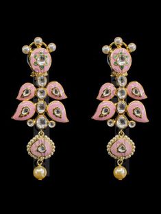 "Gulrukh Meenakari Bridal Set - Pink A pure hand-drawn detailed jewelry in the shades of soft pink and green meenakari work. This piece displays high-quality workmanship and fine usage of stones! This meenakari necklace set is perfect for western or traditional outfits. This set features a necklace with jadai detailing, featuring kundan chand motifs with lotus meenakari detailing. Delicate necklace accented with kundan stones and faux pearls creating a lush, sparkling set. The set includes a pai Traditional Chandbali Jhumkas For Designer Wear, Bollywood Style Designer Earrings With Cutdana, Bollywood Cutdana Earrings For Designer Wear, Bollywood Designer Cutdana Earrings, Traditional Meenakari Jhumkas For Designer Wear, Designer Kundan Jhumkas With Meenakari, Designer Tilla Earrings For Diwali, Diwali Designer Jewelry With Latkans, Elegant Designer Chandbalis With Meenakari