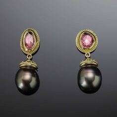 Enrich your look with these luxurious Pink Sapphire & Tahitian Black Pearl Earrings handcrafted from 18K Treasure Gold made with shipwreck treasure. Adorned with captivating rose-cut pink sapphires and enchanting Tahitian black pearls, each earring is intricately framed with delicate granulation for a truly exquisite finish. A unique find for your unique style! The beautiful pink sapphires weigh 2.02cttw and the pearls are approximately 9.4mm. Handcrafted in solid 18K gold made with 400 year-old Elegant Oval Tourmaline Earrings, Elegant Gold Tourmaline Earrings, Luxury Tourmaline Earrings As Gift, Luxury Tourmaline Earrings For Gift, Luxury Gold Tourmaline Earrings, Elegant Tourmaline Earrings For Formal Occasions, Elegant Tourmaline Earrings With Gemstone Accents, Elegant Tourmaline Teardrop Earrings, Elegant Tourmaline Drop Earrings