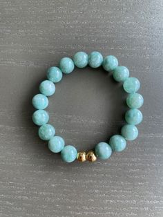 Everyday Hand-strung Beaded Bracelet, Elegant Amazonite Beaded Bracelets, Jade Beaded Bracelets With 8mm Beads As Gift, Gold Beaded Amazonite Bracelets, Handmade Amazonite Round Bead Bracelets, Everyday Rosary Bracelet With 8mm Beads, Adjustable Crystal Bracelet With Round Beads For Everyday, Meditation Beaded Bracelets With Faceted Beads, Meditation Beaded Bracelet With Faceted Beads