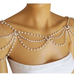 Elegance Draped in Pearls Embrace the timeless charm of our Handcrafted Vintage-Inspired Faux Pearl Shoulder Necklace. Each pearl is meticulously selected to ensure a uniform luster that cascades over your shoulders, creating a silhouette of grace and sophistication. This piece is not just an accessory; it's a testament to classic beauty that transcends trends. Craftsmanship Meets Heritage With an unwavering commitment to quality, this shoulder necklace is hand-strung with precision, integrating Pearl Shoulder Necklace, Pearl Shawl, Shoulder Chain Jewelry, Shoulder Jewelry, Shoulder Necklace, Bridal Wrap, Jewelry Luxury, Vintage Style Wedding, Necklace Pearl