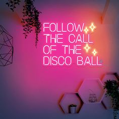 a neon sign that says follow the call of the disco ball