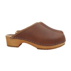 Italian production Clogs with base in real woodUpper in leatherEntirely made by specialized Italian personnelHandcrafted using the best materialsHeel height 4.5cmNon-slip rubberVery comfortable and elegant. Casual Wood Mules With Round Toe, Natural Clogs With Rubber Sole And Round Toe, Natural Clogs With Round Toe And Rubber Sole, Natural Round Toe Clogs With Rubber Sole, Casual Wooden Clogs With Wooden Heel, Natural Leather Sole Slip-on Clogs, Wooden Slip-on Mules, Closed Toe Mules With Wooden Heel, Natural Color Slip-on Clogs With Leather Sole