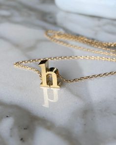 Gold vermeil, gold plated silver letter. Gold filled chain and clasp. Black spinel gems. Will come in a beautiful gift box, To see more jewelry in my shop https://www.etsy.com/shop/BijouLimon To add another letter go here https://www.etsy.com/listing/230015299/vermeil-initial-letter Turquoise Stud Earrings, Jewelry Personalized, Monogram Necklace, Gold Initial, Initial Jewelry, Black Spinel, Initial Letter, Necklace Personalized, Letter Necklace