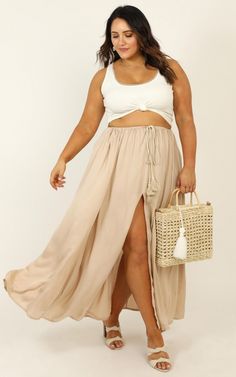 Under The Twilight Maxi Skirt In Beige | Showpo Chic Beach Rayon Skirt, Chic Rayon Skirt For The Beach, Chic Rayon Beach Skirt, Beach Skirted Rayon Bottoms, Chic Rayon Maxi Skirt For Beach, Beach Rayon Lined Skirt Bottoms, Beige Long Maxi Skirt For Vacation, Beige Tiered Lined Skirt, Summer Rayon Skirt