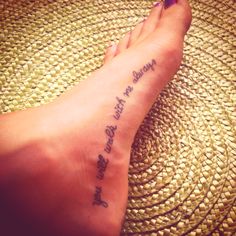 a woman's foot with a tattoo that says, i love you always and never