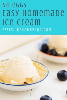 two bowls filled with ice cream and blueberries on top of a white countertop