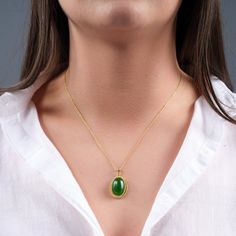 "💎 Handcrafted Jade Gemstone Necklace for Positive Energy and Wellness 💎 Embrace the beauty of Jade, a gemstone steeped in ancient history and revered for its remarkable spiritual properties. Known as the \"Stone of Serenity,\" Jade is believed to attract good luck, promote emotional healing, and inspire feelings of peace and harmony. 💎All stones are unique and may differ slightly from those shown in the pictures. No Necklace is the same, so the bracelet you order will be unique. ◖PRODUCT FEA Jade Oval Pendant With Natural Stones, Jade Amulet Pendant Jewelry, Jade Pendant Amulet Jewelry, Jade Oval Pendant Necklace With Natural Stones, Jade Necklace With Oval Pendant And Natural Stones, Oval Jade Jewelry With Natural Stones, Oval Jade Necklace With Natural Stones, Jade Gemstone Amulet Necklaces, Jade Gemstone Amulet Necklace