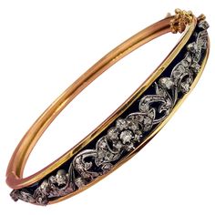 This is a stunning Museum Quality Antique Belle Epoque Rose Cut Diamond Bangle Bracelet with Royal Blue Enamel in 18 Karat Gold. The magnificent bracelet dates to the Belle Epoque - Victorian period of the 19th Century. Rose Cut and single cut Diamonds are set in a scroll and flower motif design of great beauty. The diamonds sit atop a royal blue enamel background. The combination of the spectacular diamond work and the vivid enamel is just wonderful. The diamonds are set in silver as was the cu Flower Motif Design, Diamond Bangle Bracelet, Modern Bracelets, Gold For Sale, Snake Bracelet, Diamond Bangles Bracelet, Bangles Jewelry Designs, Bracelet Blue, Enamel Bracelet