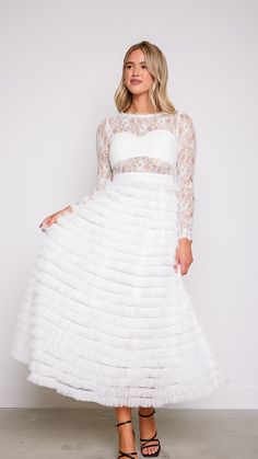 Experience the magic and allure of our Olivia Layered White Lace Tulle Dress, where timeless elegance meets modern romance. Whether you're walking down the aisle, attending a formal event, or celebrating a special occasion, this dress will make you feel like the epitome of grace and beauty. 78747 D8-2 Elegant Tulle Gown With Sweetheart Neckline, Formal Tulle Ball Gown, Elegant Ball Gown With Lined Bodice For Prom, Elegant Gown With Lace Bodice For Prom, Elegant Prom Gown With Lace Bodice, Elegant Prom Ball Gown With Lined Bodice, Fitted Bodice Floor-length Dress For Debutante Ball, Elegant Floor-length Ball Gown With Lace Bodice, Elegant Tulle Ball Gown With Lace Bodice