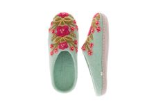 If in between sizes, size up Sold in sizes XS (6-6.5), S (7-7.5), M (8-8.5), L (9-9.5), XL (10-10.5). Take your lovely garden inside with you with these elegant Secret Garden Slippers. Inspired by ornate vintage slippers from the 1920s, each one is hand felted and hand embroidered by artisans in Nepal. Featuring intricate and bright floral embroidered designs that pop against the bright wool. 100% wool and leather sole. Hand Accessories, Wool Slippers, French Knot, Leather Slippers, Hand Felted, Seasonal Gifts, Rose Print, Embroidered Design, Secret Garden