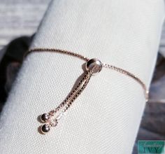 ❤Shop with us online at - https://SomethingIvy.com/❤ Adjustable Rose Gold Bracelet - Rose Gold Jewelry - Bracelets - Rose Gold Hand Jewelry Fits any wrist! Adjustable notch allows for pull draw string style. Matching Earrings available! Sign up for promotions here - https://somethingivy.com/pages/promo-sign-up Lovely bracelet, available in Bulk for Bridesmaids Orders or Group orders, please message. The bracelet is rose gold plate and cubic zirconia Pairs well with our rose gold tiaras, rose gol Adjustable Chain Bracelet For Wedding On Valentine's Day, Elegant Adjustable Chain Bracelet For Valentine's Day, Adjustable Bracelets For Valentine's Day Formal, Rose Gold Jubilee Beaded Bracelet As Gift, Adjustable Rose Gold Charm Bracelet For Parties, Rose Gold Charm Bracelet With Jubilee Bracelet, Rose Gold Charm Bracelet With Jubilee Detail, Adjustable Chain Bracelet For Valentine's Day Party, Adjustable Chain Bracelet For Party On Valentine's Day