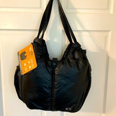 This Is A Really Nice Large Black Yoga Bag. It’s Very Lightweight With Lots Of Pockets. There Are Two Large External Side Pockets (Perfect For Water Bottles, Soppy Cups Or Baby Bottles.). The Interior Is A Bright Purple And Has Lots Of Deep Pockets. This Bag Would Be Perfect For A Variety Of Uses Including Yoga, Dance, Gym, And Baby Bag! Measurements Are 18.5 Inches Wide By 12 Inches High (In The Middle) By 5 Inches Deep With A Drop Of 15 Inches. Check Out My Other Listings For More Beautiful Bags And Accessories! Lightweight Nylon Shoulder Bag For Everyday Use, Versatile Packable Black Shoulder Bag, Versatile Black Packable Shoulder Bag, Lightweight Functional Nylon Bags, Functional Lightweight Nylon Bags, Nylon Gym Bag With Zipper Closure, Black Travel Bag With Snap Closure, Black Nylon Packable Bags, Nylon Shoulder Bag For Sports