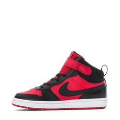 a pair of black and red sneakers on a white background