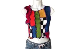 One of a kind color block pop art sweater top, size Small. ❤️DESCRIPTION:  One of a kind, 80% recycled patchwork knit top. Brlliant color block top in a color palette of lime green, orange, yellow, blue, pink, purple, and black & white. Both the front and the back have the same motif. Midriff-baring cropped length. Versatile and so easy to wear. Pair it with distressed jeans, joggers, a skirt - whatever motivates you, for a one of a kind look. And feel good about choosing slow fashion with recyc Casual Patchwork Sleeveless Sweater Vest, Multicolor Knit Sweater Vest With Crew Neck, Multicolor Knit Crew Neck Sweater Vest, Retro Knit Color Block Tops, Fitted Knit Color Block Tops, Casual Multicolor Patchwork Tops, Retro Color Block Knit Tops, Fitted Multicolor Sweater Vest For Fall, Colorful Fitted Color Block Top