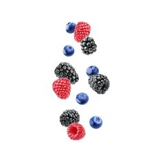 raspberries and blueberries are arranged in the shape of a letter