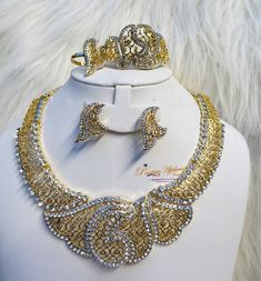 Gold Flowery Beads African  Necklace Party Jewelry Set Complete Set is Necklace Earring and bracelet Wedding Party Bridal Special Occasion This detailed Jewellery set makes you stand out elegantly in any special occassion, it's all about glamour and uniqueness.  Buying more that 1 Jewellery set, we offer wholesale and bulk prices for all our jewellery. Gold Bridal Sets For Party, Gold Crystal Bridal Sets For Party, Gold Beaded Jewelry Sets For Party, Party Gold Beaded Jewelry Sets, Festive Gold Crystal Jewelry Sets, Party Costume Bridal Necklace With Hand Set, Formal Gold Beaded Jewelry Sets, White Elegant Jewelry Sets For Party, Elegant Beaded Jewelry Sets For Celebration