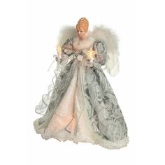 an angel figurine holding two candles in its hands and wearing a white dress