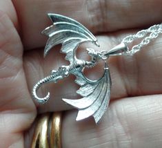 Overseas Buyers, can you please include a Mobile Phone number for the Courier for tracking updates. Follow me on Instagram to see my latest listings A smaller Sterling Silver Dragon Pendant, on a Sterling Silver Chain.  Measures 2.93cm by 2.65cm to the top of the bale. Shipping will be combined to reduce postage costs and includes a Gift Box made in England using 100% FSC Accredited and 100% Recyclable Board and Paper.  Checkout by 8.30am ensures same day dispatch. Item will be dispatched by Roy Silver Dragon Necklace, Dragon Necklace, Silver Dragon, Dragon Pendant, Sterling Silver Chain, Sterling Silver Chains, Phone Number, Silver Chain, Necklace Etsy