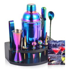 an assortment of colorful cocktail garnishments on a black stand