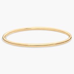 Simple, luxurious and elegant what don't we love about this yellow gold bangle. Plus, the stacking potential is endless. Classic White Gold Bangle In 14k Gold, Minimalist White Gold Bangle For Everyday Luxury, Elegant Everyday Bracelets With Round Band, Elegant Everyday Round Band Bracelets, Elegant Everyday Round Band Bracelet, Classic 14k White Gold Bangle, Everyday Timeless Stackable Bangle, Yellow Gold Luxury Bangle, Everyday Luxury 14k Gold Stackable Bangle