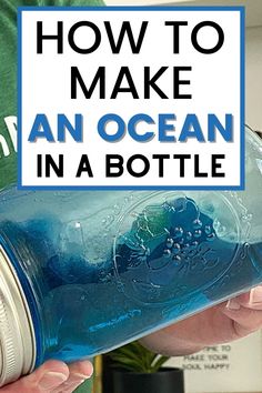 a person holding a blue bottle with the words how to make an ocean in a bottle