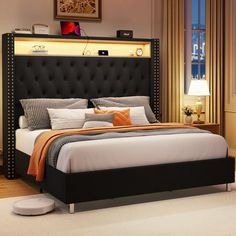 a bedroom with a bed, night stand and lamps on the side of the room