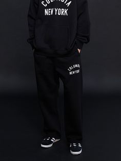 This is a comfortable and casual pants that are made out of high quality cotton and polyester fabric. With design detail of comfortable loose silhouette and elastic waistband with string, it gives a trendy and refined look.- Soft fleece fabric- Adjustable string on the hem- Elastic waistband with string- Loose silhouette Straight Leg Cotton Sweatpants With Letter Print, Black Cotton Pants For Leisure, Black Cotton Joggers With Drawstring, Urban Drawstring Sweatpants For Loungewear, Black Straight Leg Sweatpants With Letter Print, Cotton Straight Sweatpants For Elevated Casual, Black Drawstring Leisure Pants, Black Leisure Sweatpants Straight Fit, Black Sweatpants With Elastic Waistband For Leisure