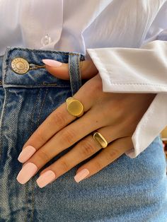 Elevate your style with our stunning Minimalist Gold Signet Rings. These rings combine elegance and modern design, perfect for those who love a simple yet bold statement. Crafted with high-quality materials, each ring is both durable and comfortable, making it ideal for everyday wear or special occasions. Whether you're looking for a chunky gold ring to make a statement, or a minimalist and adjustable design for versatile styling, this collection has something for everyone. These rings are perfe Signet Ring Styling, Trendy Wide Band Open Ring For Everyday, Trendy Everyday Dome Ring, Minimalist Wide Band Ring Tarnish Resistant, Minimalist Everyday Wide Band Ring Tarnish Resistant, Minimalist Wide Band Open Ring Tarnish Resistant, Minimalist Wide Band Open Ring, Tarnish Resistant, Minimalist Oval Midi Rings, Minimalist Tarnish-resistant Wide Band Ring For Everyday