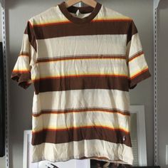 Vintage Hang Ten Striped Tee It's In Excellent Condition Measurements Lying Flat: 19" Pit To Pit 25" Top Of Shoulder To Bottom Hem Feel Free To Ask Questions :) Retro Crew Neck Top With Relaxed Fit, Vintage Cotton Shirt With Crew Neck, Vintage Cotton Crew Neck Shirt, Retro Cotton Tops With Relaxed Fit, Vintage Brown Tops For Summer, Brown Retro Top With Relaxed Fit, Vintage Crew Neck Tops In Relaxed Fit, Retro Striped Tops With Relaxed Fit, Relaxed Fit Brown Shirt With Crew Neck