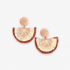 Dive into the vibrant colors of summer with our Josephine Grapefruit Raffia Drop Earrings in Blush Pink. The playful grapefruit slice design, crafted from raffia and glass beads, adds a burst of bold energy to your ensemble. So grab your favorite sun dress, a cute pair of sandals, and get vacation-ready with your favorite new citrus earrings. --DETAILS-- 1.79" L, 1.57" W Handmade by skilled artisans in India Hypoallergenic nickel + lead-free brass hardware These accessories are made by human hands. A slight variation in size and color is considered part of the beauty of these one-of-a-kind pieces. To extend the life of your accessories, store them in a dry place while swimming, showering, or working out. Original design copyright INK+ALLOY© --END OF DETAILS-- Coral Earrings For Beach Summer, Coral Earrings For Beach And Summer, Coral Earrings For Summer Beach Occasion, Orange Earrings For Spring Beach Outing, Orange Summer Earrings For Vacation, Summer Beach Coral Earrings, Trendy Coral Jewelry For Summer, Trendy Coral Summer Jewelry, Orange Spring Vacation Jewelry