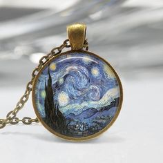 This listing is for one handmade art pendant with matching link chain. A glass dome is sealed over the artwork to protect and magnify the image, then set into a bronze or silver plated bezel. Metal is lead and nickel free.Pendant measures 1 inch (25mm) in diameter. Chain length is 24 inches long (61cm).Snake Chains are available here:https://www.etsy.com/shop/MissingPiecesStudio?section_id=14179823Ships in 3-5 business days from Tucson, AZ. All shipments will be sent first class via USPS. Please Artsy Gold Round Pendant Necklace, Artistic Nickel-free Necklace For Gifts, Bronze Cabochon Necklace For Gifts, Artistic Round Pendant Necklaces For Art Collection, Artsy Brass Jewelry For Gifts, Bronze Jewelry With Artistic Design, Artistic Bronze Jewelry With Artistic Design, Artsy Gold Pendant Jewelry, Gold Necklaces For Gifts