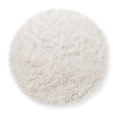 a white round rug with shaggy fur on the top and bottom, in front of a white background