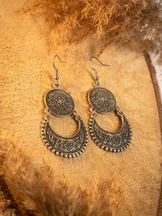 Pair of earrings handcrafted by talented artisans in the heart of Morocco. The traditional authenticity of these silver plated earring evoke the finesse of the orient. They are lightweight and comfortable to wear. ☀️ Exceptional Craftsmanship: Each pair is the result of meticulous work, showcasing the ancestral Moroccan craftsmanship. They are also unique pieces, bearing the imprint of the artisan who created them. The delicate patterns and finishes reflect the rich artistic heritage of Morocco. ☀️ Timeless Elegance: Their authentic design, inspired by oriental motifs and aesthetics, adds a touch of refinement to any outfit, from casual to sophisticated. ☀️ Gift Idea: Whether for yourself or a loved one, these earrings are an ideal choice to delight with original jewelry. By purchasing thi Bohemian Sterling Silver Chandelier Earrings, Bohemian Sterling Silver Chandelier Earrings For Festivals, Bohemian Sterling Silver Drop Earrings, Handmade Silver Jewelry For Festivals, Bohemian Silver Brass Jewelry, Bohemian Antique Silver Jewelry For Festivals, Antique Silver Bohemian Jewelry For Festivals, Bohemian Sterling Silver Nickel-free Earrings, Bohemian Nickel-free Sterling Silver Earrings