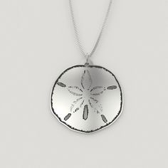 This sterling silver sand dollar necklace is a beautiful reminder of the ocean waves and summer days at the beach all year long.  It has an incredible shine that you will love every time that you look at it. Charm comes in four sizes: - 3/4in (20mm) - 1in (24mm) - 1.18in (30mm - 1.5in (38mm) Chains come in two lengths: - 18in (45cm) - 20in (50cm) Charms are a sturdy and solid .032in (0.8mm), 20 gauge sterling silver. Chains are a .047in (1.2mm) thickness Italian sterling silver curb chain. All j Beachy Starfish Necklace For Gift, Beachy Starfish Necklace Gift, Ocean-inspired Starfish Necklace For Beach, Ocean-inspired Sterling Silver Beach Jewelry, Starfish Charm Strand Jewelry Gift, Starfish Charm Strand Jewelry For Gift, Beachy Starfish Charm Jewelry For Gifts, Ocean-inspired Round Jewelry With Starfish Charm, Sterling Silver Pendant Jewelry For Beach