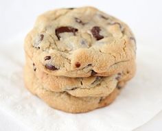 three chocolate chip cookies stacked on top of each other