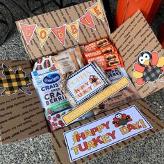 some thanksgiving treats are in a box on the ground