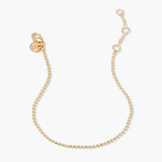 The dainty Mae Bracelet creates a refined sense of style whether worn on its own or layered with other favorite bracelets. Delicate and sweet, this 14k gold-plated beauty is a timeless piece for effortless elegance. Available in 14k gold plated brass 6" diamond cut ball chain with 1" extender Lobster claw closure SKU: BYB1037 Dainty Yellow Gold Beaded Bracelets In 14k Gold Filled, Dainty 14k Gold Bracelet With Extender, Everyday Yellow Gold Charm Bracelet With Extender, Chic 14k Gold Bracelets, Chic Everyday 14k Gold Bracelets, Minimalist Gold-plated Bracelet With Extender, Dainty Yellow Gold Bracelet With Extender, Elegant 14k Gold Filled Bracelet With Extender, Minimalist Single Strand Bracelet