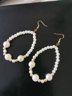 Pearl earrings are truly the symbol of elegance and timeless chic. They bring a touch of refinement to any outfit and illuminate the face of those who wear them. Their delicate appearance and natural shine testify to their preciousness and beauty. They are also the ideal gift to celebrate significant events such as a birthday, a graduation or a wedding. Timeless, pearl earrings are an undeniable asset of seduction. They bring a note of subtle elegance that leaves no one indifferent. Whether you Pierced Round Pearl Jewelry, Pearl White Jewelry For Formal Occasions, Classic Single Pearl White Earring, Pearl White Pear-shaped Party Jewelry, White Pear-shaped Party Jewelry, Elegant Pierced Teardrop Earrings For Party, Classic White Pearl Earrings For Party, Elegant Hoop Clip-on Earrings For Formal Occasions, Elegant Hoop Clip-on Earrings For Formal Events