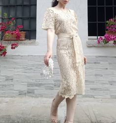 Vintage 60s cream cotton lace tailored dress. Not lined, needs a slip or suitable underwear. Coordinated belt with bow and long ribbons. Beautiful cut, a really graceful dress, perfect for a bride to be. Excellent vintage conditions. Best for for size S and XS. Model's size 6 UK, h 163 cm. Elegant Beige Lace Dress With Delicate Details, Elegant Beige Lace Dress With Delicate Lace, Elegant Beige Lace Dress For Garden Party, Feminine Beige Lace Dress With Delicate Details, Feminine Delicate Lace Beige Dress, Feminine Beige Delicate Lace Dress, Beige Lace Dress For Formal Summer Events, Beige Lace Dress For Summer Formal Events, Feminine Beige Lace Dress With Scalloped Edges