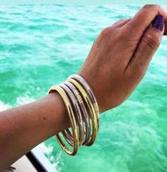 “Frill” up your style with our Jelly Beach Bangle Bracelets! Our Jelly Bangles let you hit the shore with bling on your wrists, without having to worry about ruining your “good” jewelry. Swim, sweat and shower in our weatherproof bangles. Made to be stacked, our show-stopping bangle stacks, will take you from the beach to the after party in coastal style. Mix and match the color to your outfit. Mix and Match the color together Premium Glitter tucked into clear tubing Weightless, Soundless, Water Gold Beachy Bracelets For Summer, Summer Beach Stackable Jewelry, Trendy Gold Bracelets For Beach Season, Trendy Beach Season Bracelet Jewelry, Adjustable Jewelry For Beach Season Parties, Trendy Beach Season Jewelry Bracelet, Gold Bracelet For Beach Season, Gold Bracelet Jewelry For Beach Season, Silver Jewelry For Beach Season Party