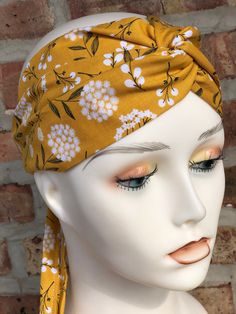 This is a very stylish turban headband made with 100 % High-Quality Cotton Fabric. It is one size fits all since I made it with adjustable straps. Great as an everyday hair accessory at home, workout, going outdoors...! It is very comfortable and non-slip and good for long or short hair! No returns or exchanges are accepted but message me if you have a problem with the order. Thank you for supporting my small home-based business.