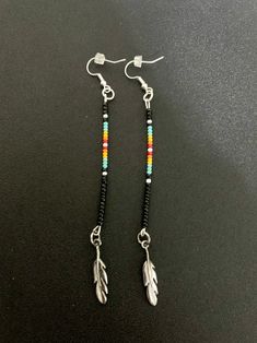 The Buffalo Sundance Earrings - Etsy Adjustable Dangle Crystal Earrings With Ear Wire, Adjustable Dangle Chandelier Earrings, Silver Earrings With Colorful Beads, Adjustable Silver Earrings With Colorful Beads, Silver Beaded Earrings With Colorful Beads For Festival, Adjustable Dangling Beads Earrings For Festivals, Bohemian Silver-plated Drop Earrings, Bohemian Silver Plated Drop Earrings, Nickel-free Metal Beaded Dangle Earrings