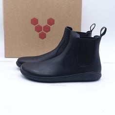 VivoBarefoot Women's Geo Chelsea Barefoot Leather Boots Obsidian 201057-01 - New in box, box is damaged. We only sell 100% genuine products, sourced from major retailers. Please let us know if you have any questions. Return policy: Returns accepted within 30 days of delivery. Returned item should be in the same exact condition as listed during sale. Original box (if applicable), packaging and all accessories should be included when returning the item. Once inspected, full refund (excluding shipping both ways unless item is not as described) will be issued. Impact-resistant Low-top Leather Waterproof Boots, Barefoot Chelsea Boots, Low-top Waterproof Boots With Vibram Sole For Walking, Functional Low-top Waterproof Boots With Vibram Sole, Black Low-top Waterproof Boots With Vibram Sole, Vivo Bearfoot Shoes, Barefoot Boots, Sustainable Style, Barefoot Shoes