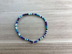 Blue and black glass bead bracelet Casual Blue Beaded Bracelet With Faceted Beads, Casual Blue Faceted Beaded Bracelets, Casual Blue Faceted Beads Bracelet, Adjustable Blue Bracelets With Black Beads, Casual Blue Beaded Bracelets With Spacer Beads, Blue Bracelet With Black Beads Jewelry, Casual Blue Bracelets With Faceted Beads, Blue Bracelet With Black Beads, Casual Blue Bracelet With Faceted Beads