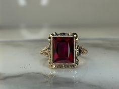 10kt yellow gold ring set with a 9.5x7.5mm synthetic Ruby! Weighs 2.0dwt, is 13.7mm at its widest point and is currently a size 6.25 but can be resized! Ruby Vintage Ring, Lannister Aesthetic, Red Sapphire Ring, Beautiful Fingers, Jewelry Smithing, Spooky Accessories, Ruby Engagement Ring Gold, Ruby Jewelry Ring, Vintage Ruby Ring